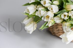 Horizontal stock photo of flowers in basket