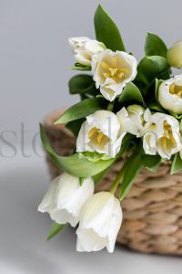 Vertical stock photo of flowers in basket