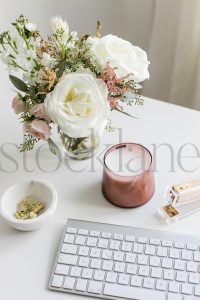 Vertical stock photo of feminine desktop