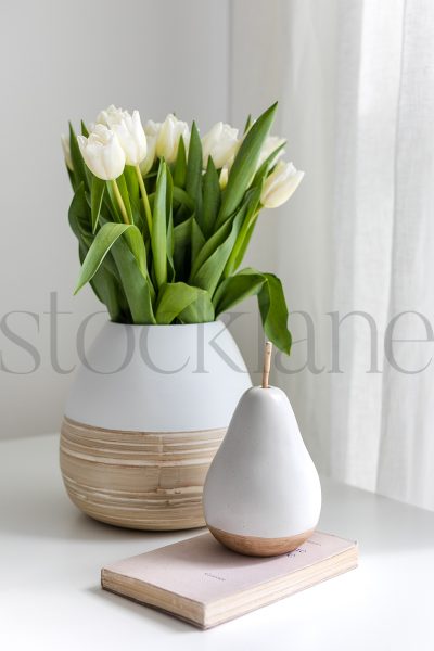 Vertical stock photo of pear and flowers