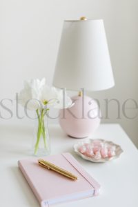 Vertical stock photo of feminine desktop