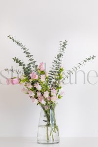 Vertical stock photo of flowers in vase