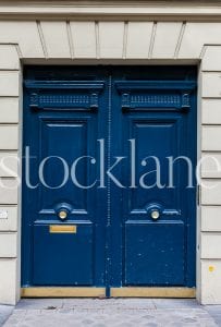 Vertical Stock photo of a blue door in Paris