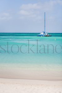 Vertical stock photo of boat in the sea