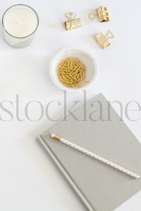 Vertical stock photo of feminine desktop