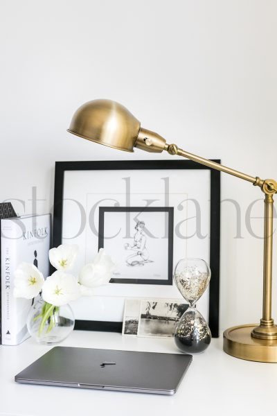 Vertical stock photo of feminine desktop