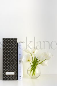 Vertical stock photo of feminine desktop