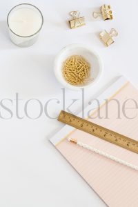 Vertical stock photo of feminine desktop