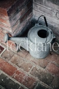 Vertical Stock photo with watering can