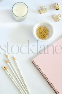 Vertical stock photo of feminine desktop