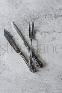 Vertical stock photo of vintage cutlery