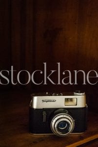 Vertical stock photo of vintage camera