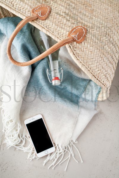 Vertical stock photo of beach basket a