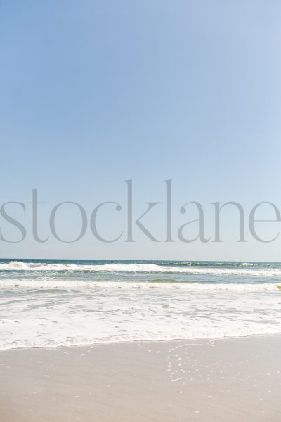 Vertical stock photo of the beach