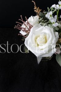 Vertical stock photo of white flower arrangement