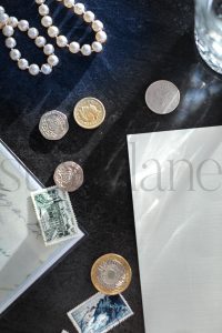 Vertical Stock Photo of coins and stamps