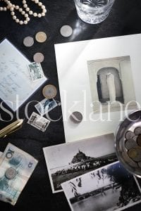 Vertical stock photo of coins and stamps