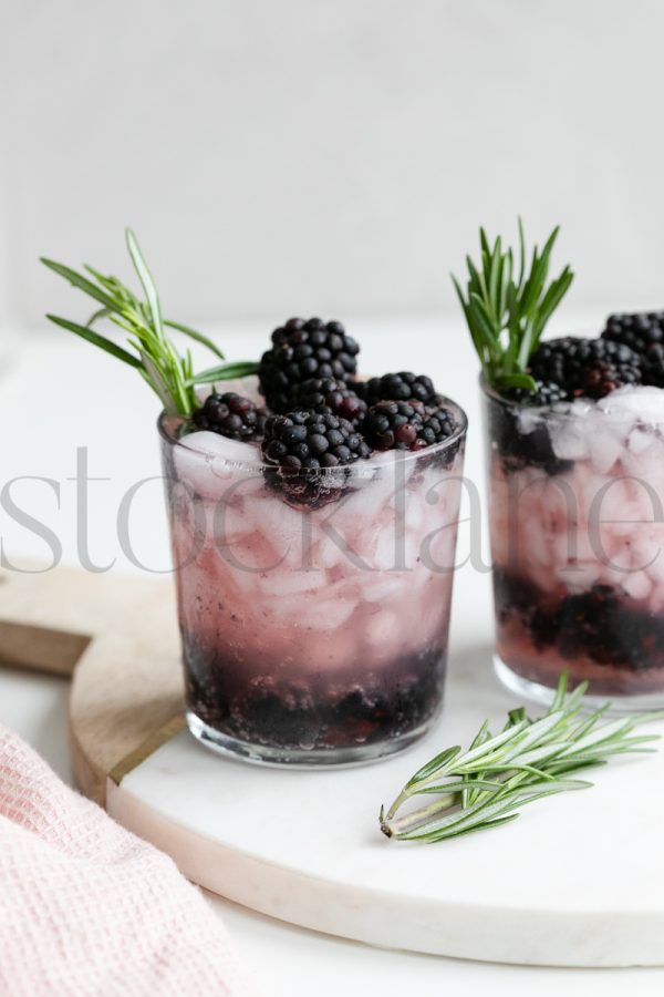 Vertical stock photo of blackberry drinks