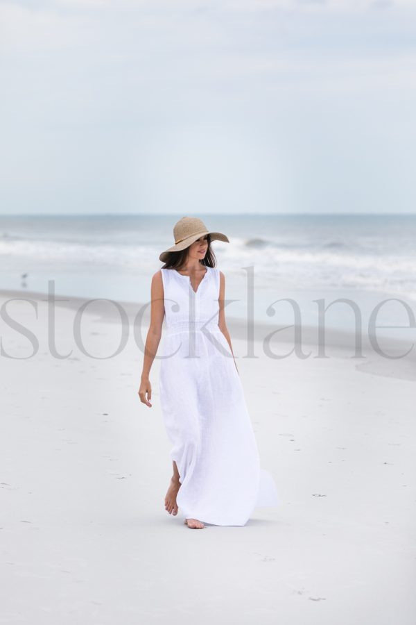 Vertical stock photo of woman at the beach