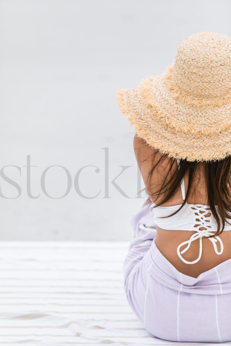 Vertical stock photo of woman at the beach