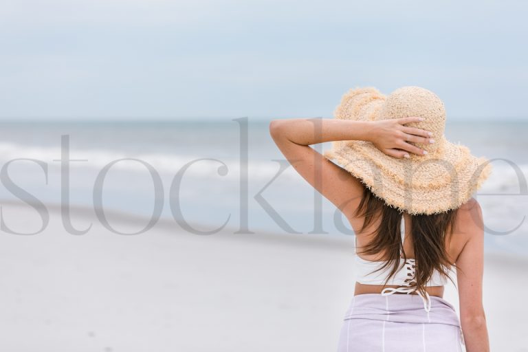 Horizontal stock photo of woman at the beach