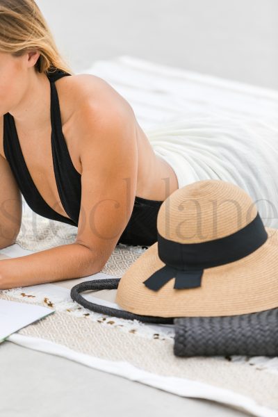 Vertical stock photo of woman at the beach