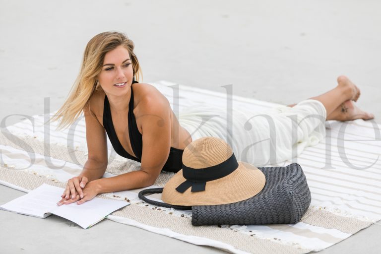 Horizontal stock photo of woman at the beach