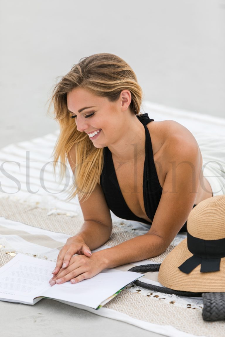 Vertical stock photo of woman at the beach