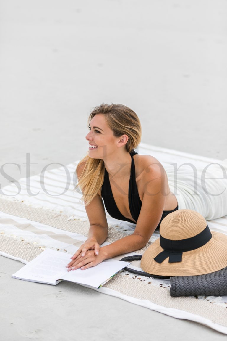 Vertical stock photo of woman at the beach