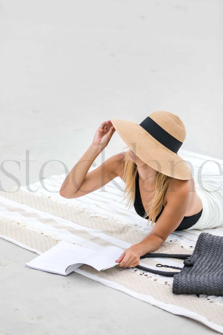 Vertical stock photo of woman at the beach