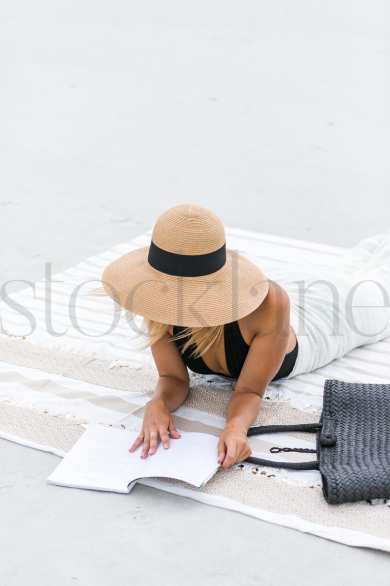 Vertical stock photo of woman at the beach