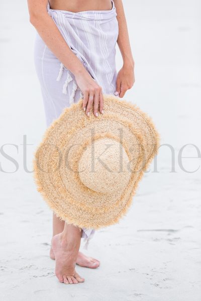 Vertical stock photo of woman at the beach