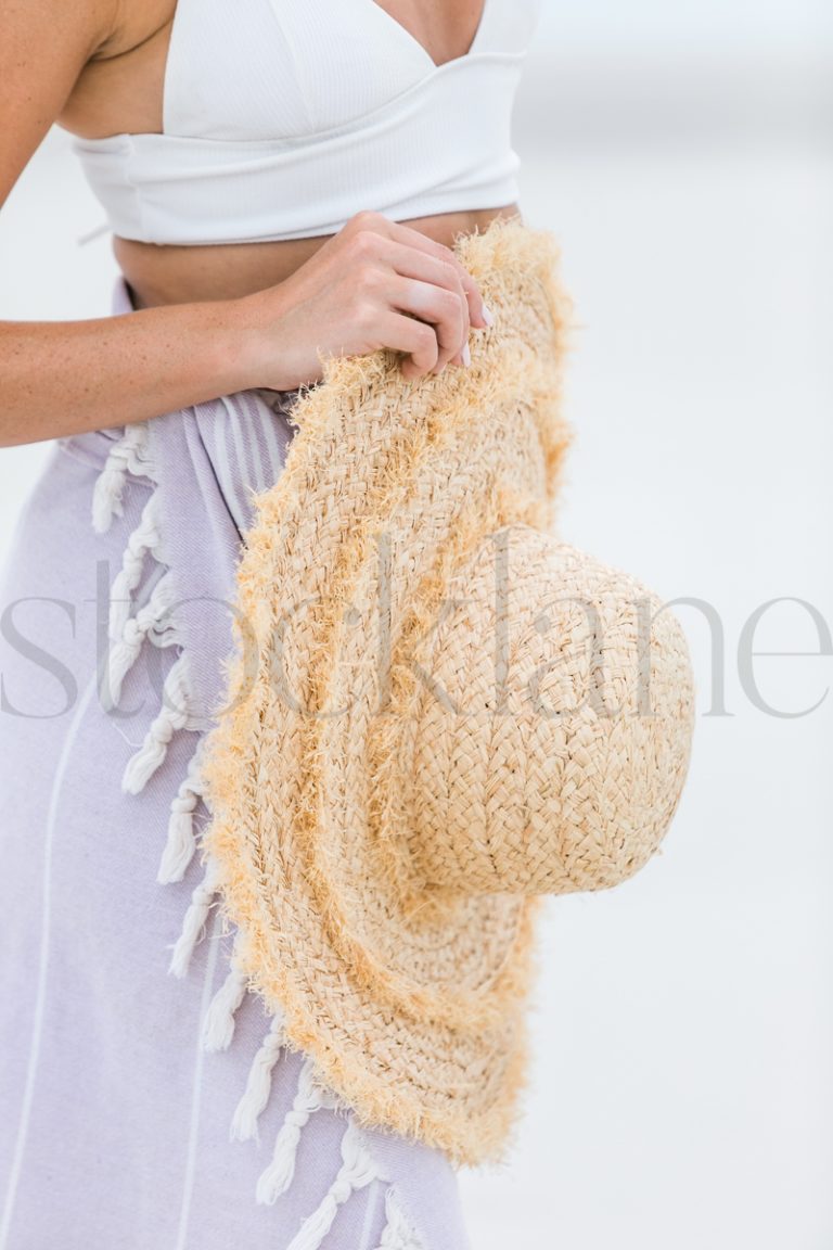 Vertical stock photo of woman at the beach