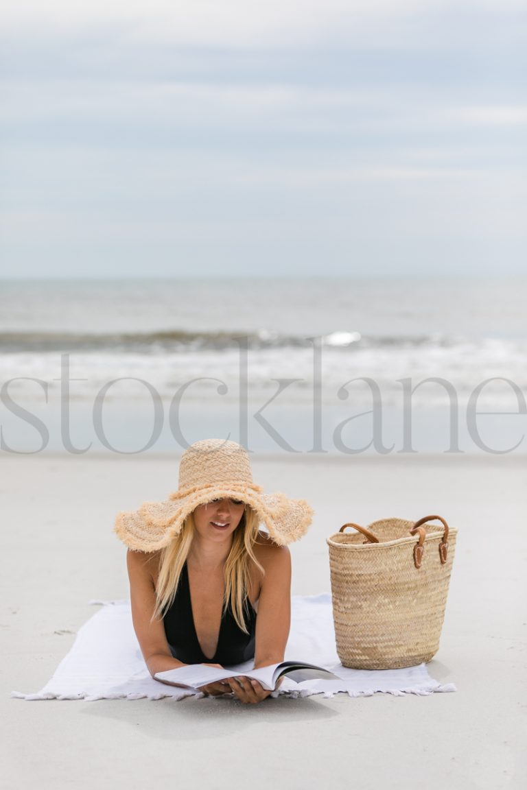 Vertical stock photo of women on the beach