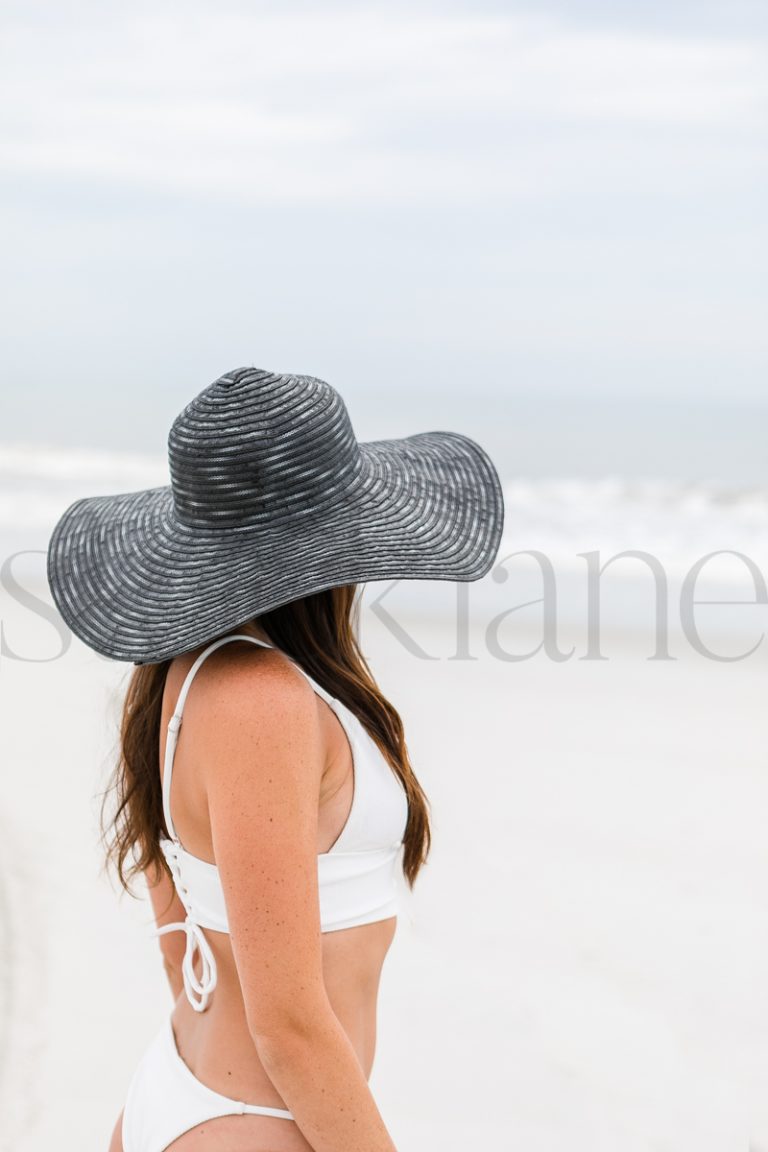 Vertical stock photo of women on the beach