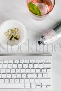 Vertical Stock photo of lotion and keyboard