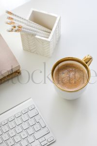 Vertical stock photo of feminine desktop