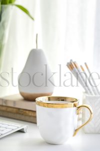 Vertical stock photo of feminine desktop