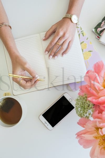 Vertical stock photo of woman with coffee