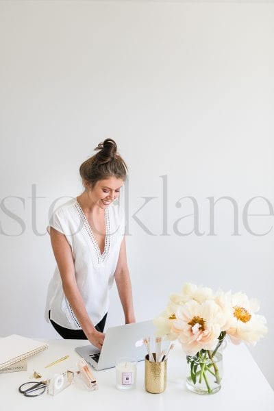 Vertical Stock photo of woman with computer