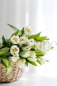 Vertical stock photo of flowers in basket