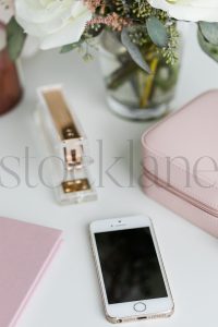 Vertical stock photo of feminine desktop