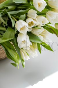 Vertical stock photo of flowers in basket