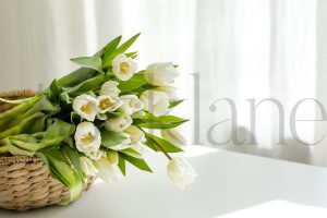 Horizontal stock photo of flowers in basket