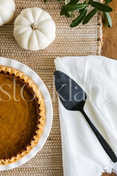 Vertical stock photo of pumpkin pie