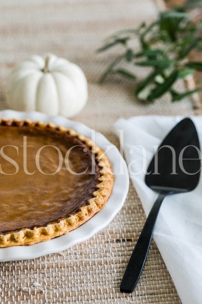 Vertical stock photo of pumpkin pie