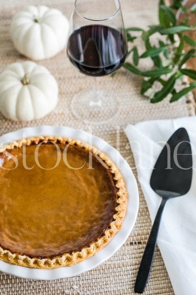 Vertical stock photo of pumpkin pie