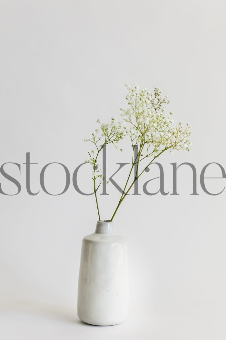 Vertical stock photo of vase with flowers