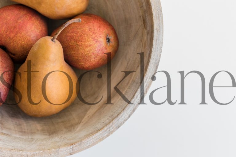 Vertical stock photo of pears in a bowl