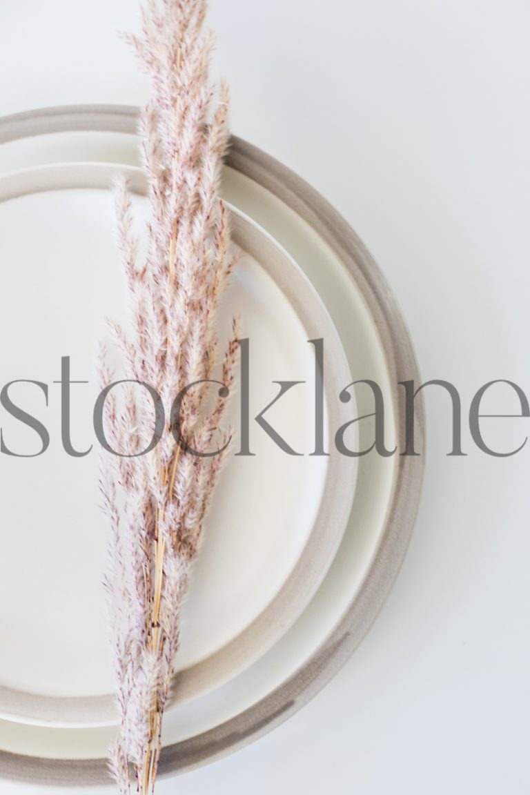 Vertical stock photo of neutral place setting